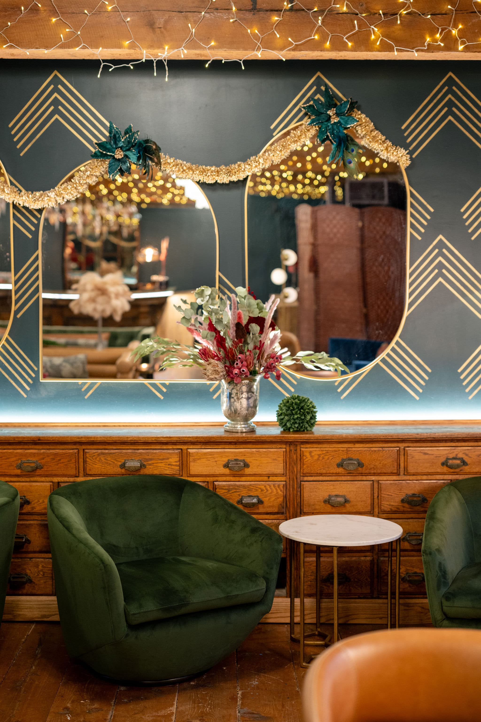 Green velvet seating at The Junction Bar and Lounge