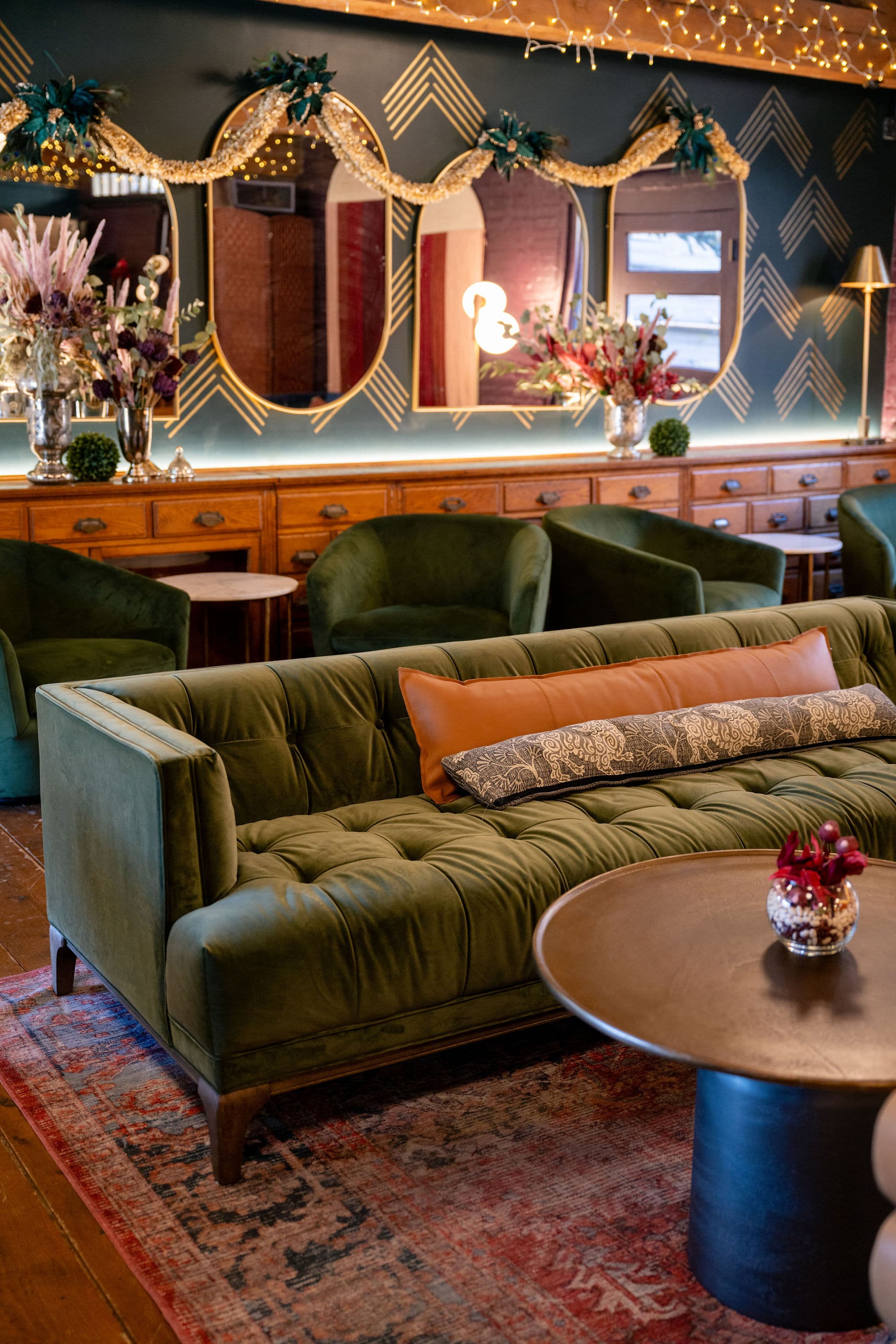 Inside The Junction Bar and Lounge — velvet seating and mirrored wall